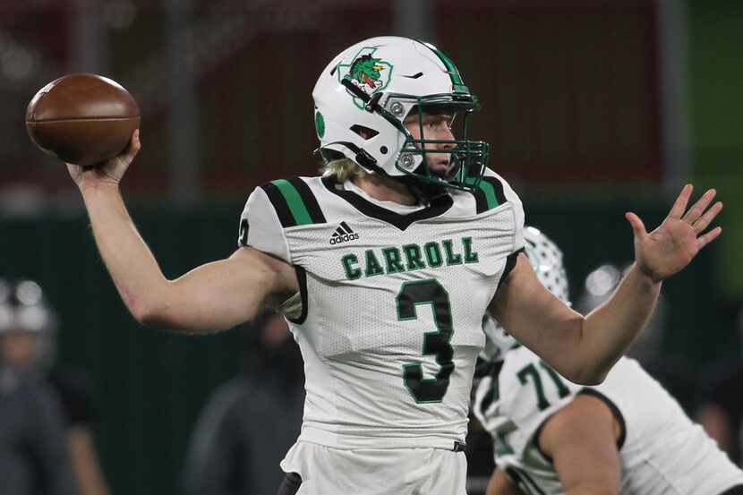 Southlake quarterback Quinn Ewers (3) passes downfield during first quarter action of their...