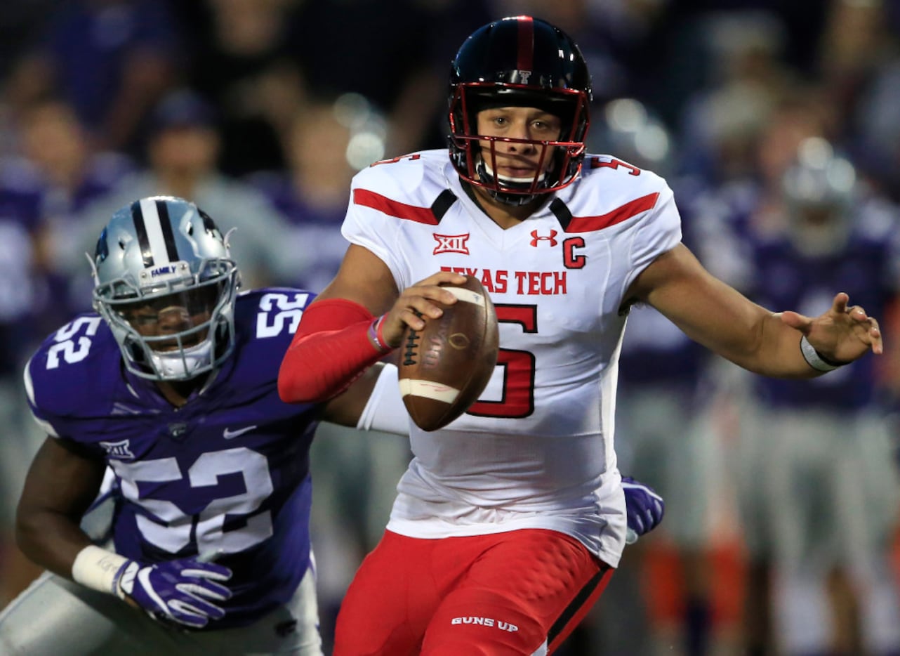 Patrick Mahomes Texas Tech Red Raiders Unsigned Black Jersey Throwing Close  Up Photograph