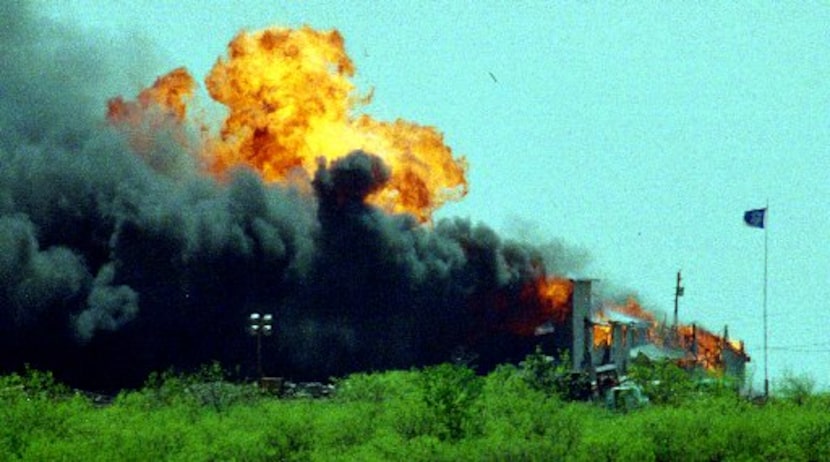 The Branch Davidian compound was rocked by an explosion after the Davidians set fire to it...