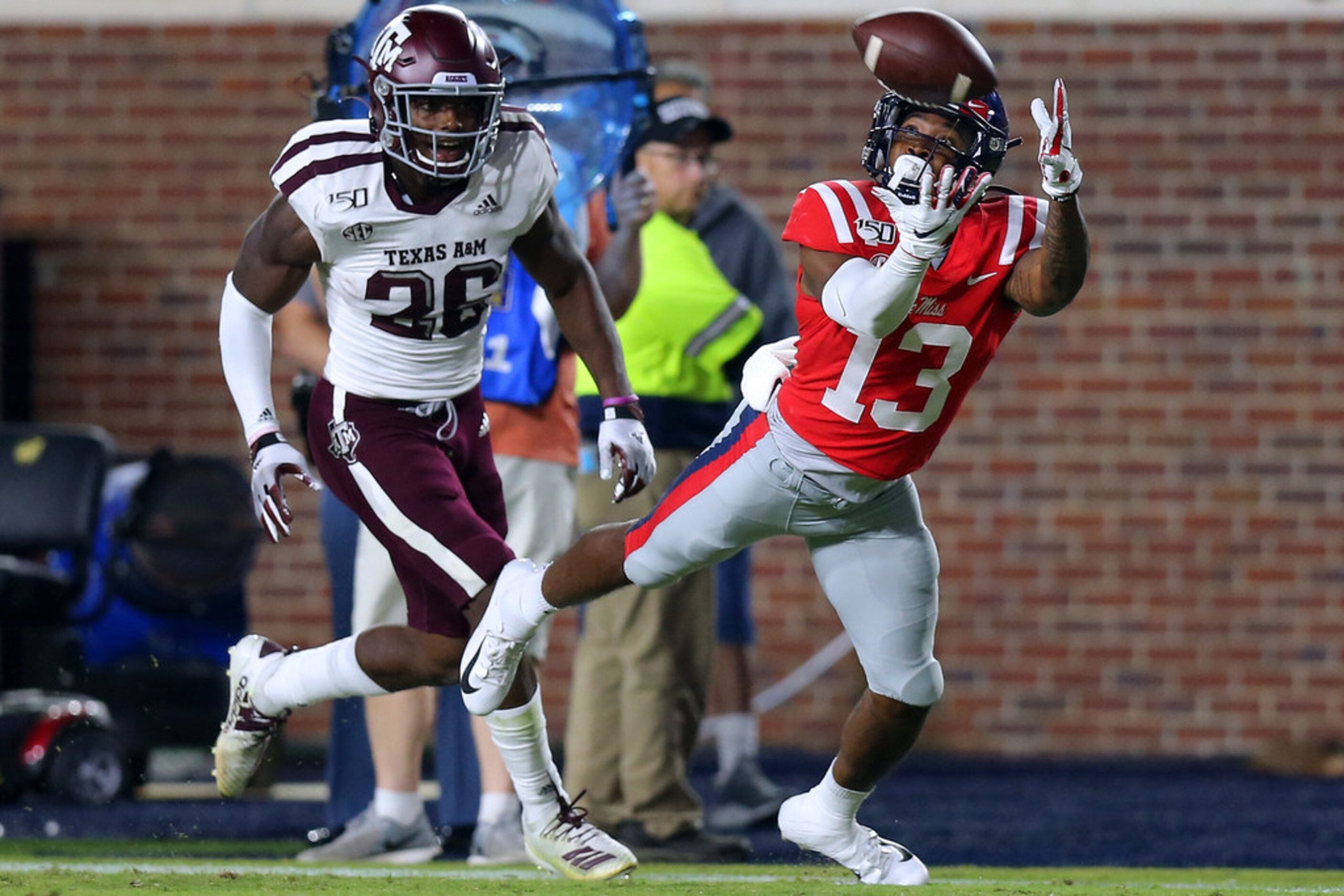 OXFORD, MISSISSIPPI - OCTOBER 19: Braylon Sanders #13 of the Mississippi Rebels attempts to...