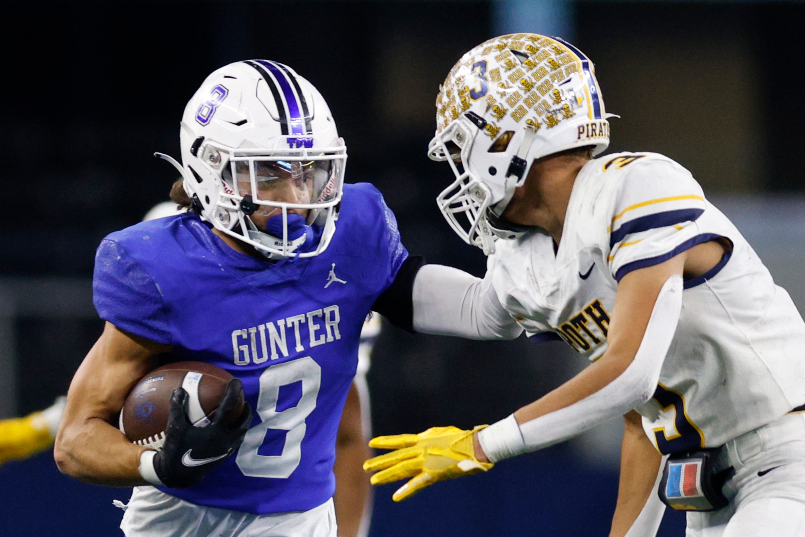 Gunter running back Ethan Sloan (8) fights off a tackle from Poth defensive back Gabriel...