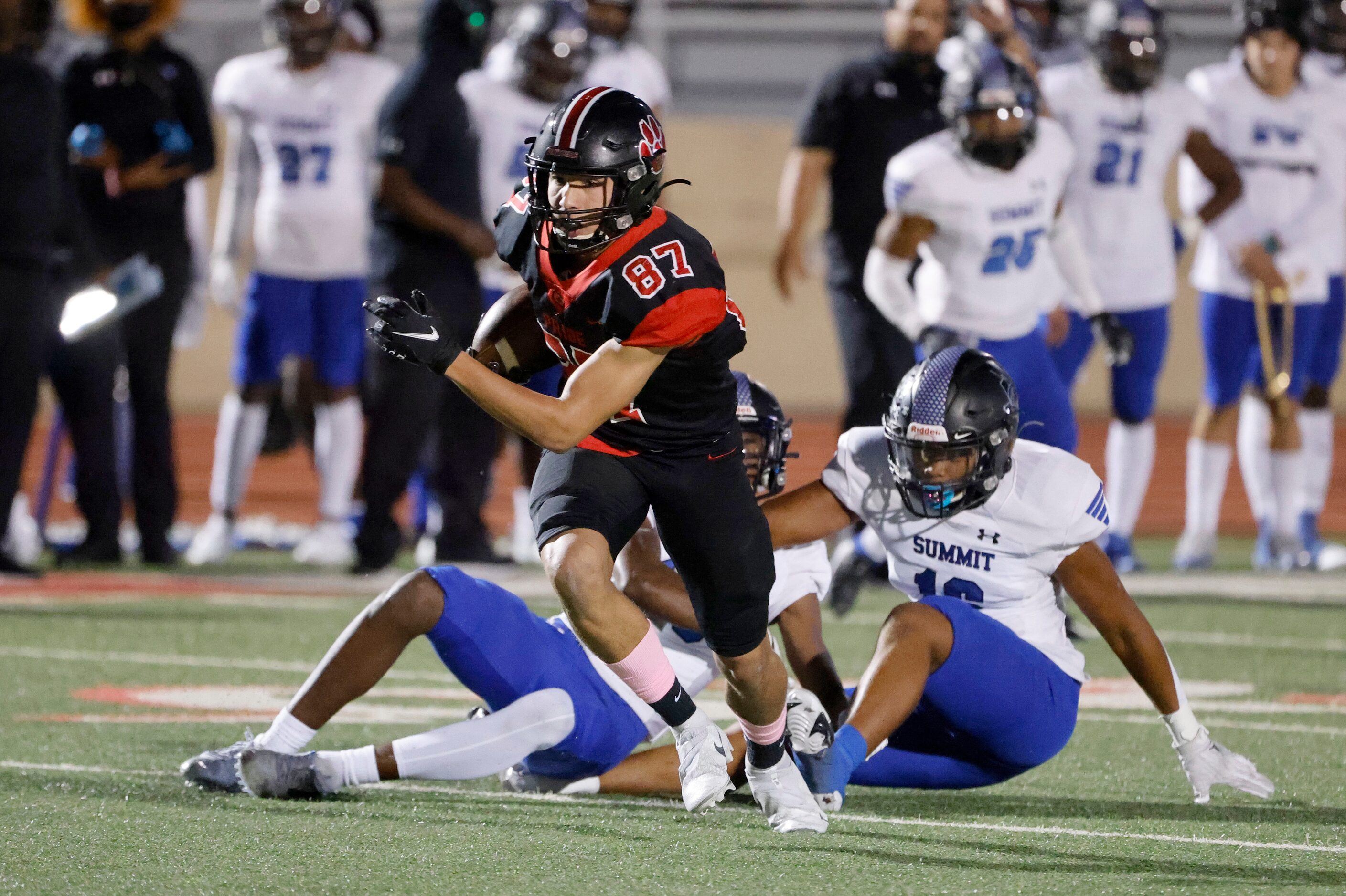 Colleyville Heritage receiver Braden Blueitt runs for a touchdown as Mansfield Summit...