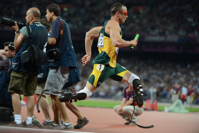 South Africa's doble amputee runner Oscar Pistorius competes in the men's 4 x 400m relay...