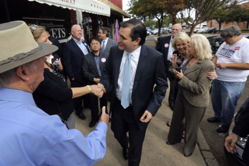 Louis Bridges (left) was among supporters greeting U.S. Senate candidate Ted Cruz on...
