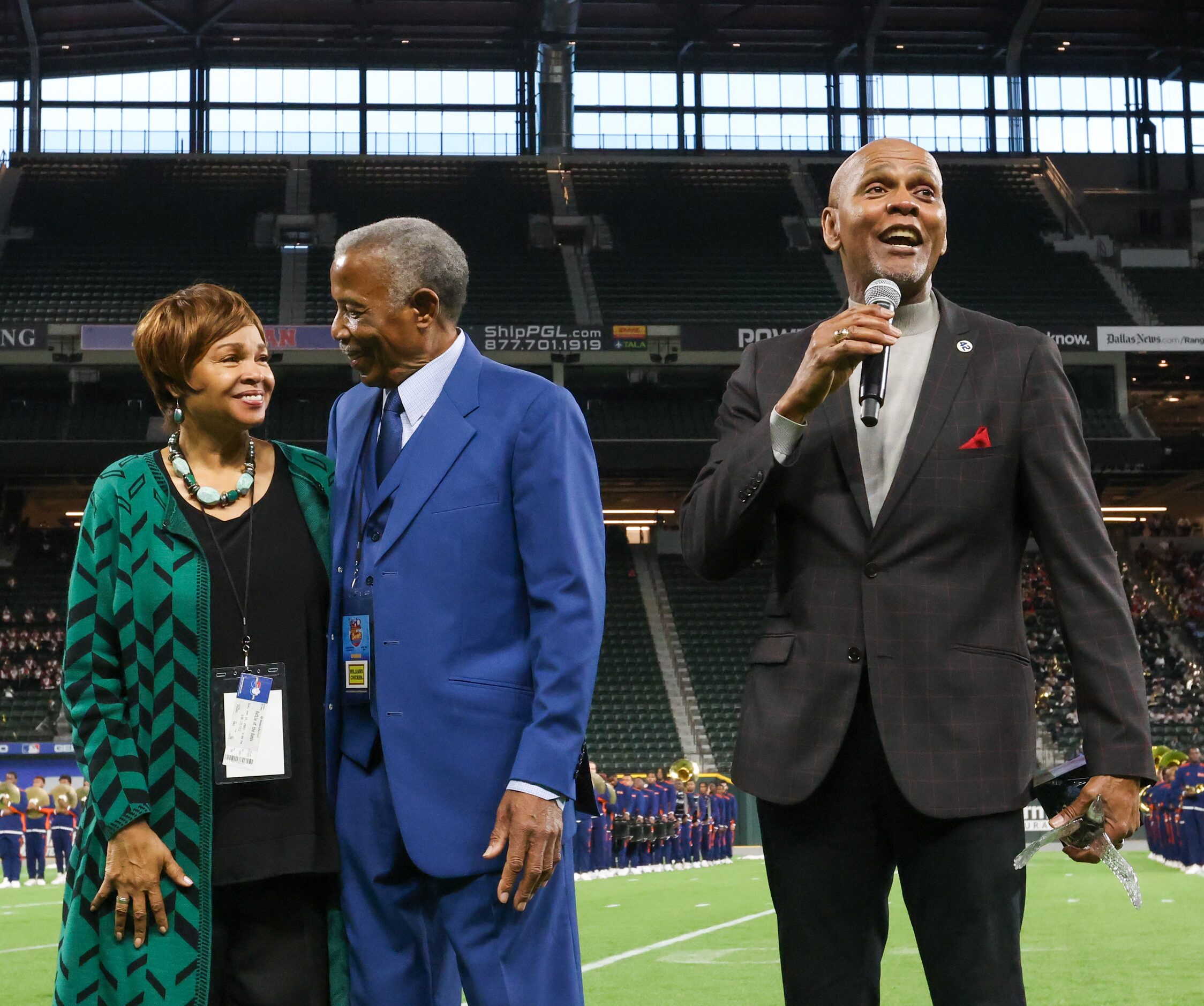 Doris Williams (left) and Hiawatha Williams stand next to Roland Parrish (right) after...