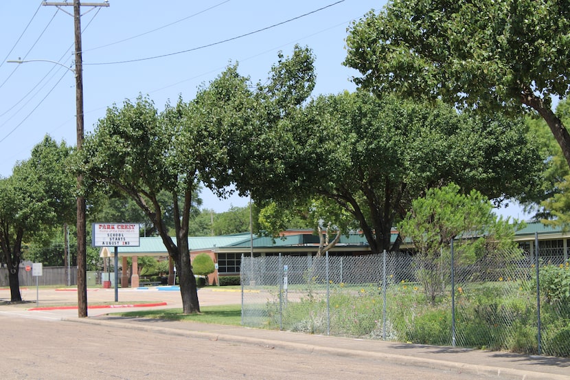 A company placed fencing around a garden at Park Crest Elementary School on July 23.