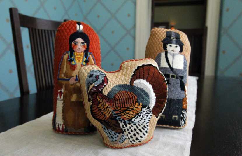 A needlepoint Thanksgiving display stitched by Diann Stadler is one of the examples of...