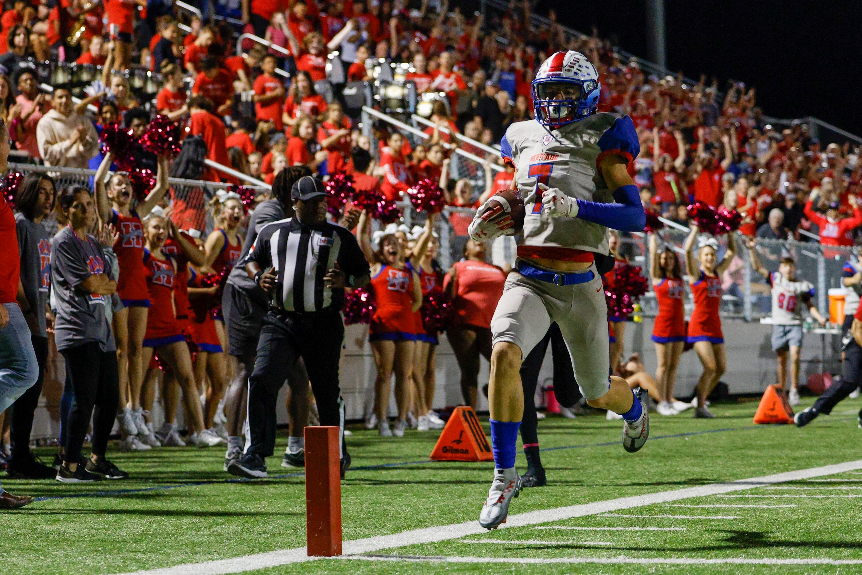 Midlothian Heritage wide receiver Stetson Sarratt (7) strides into the end zone for a 73...