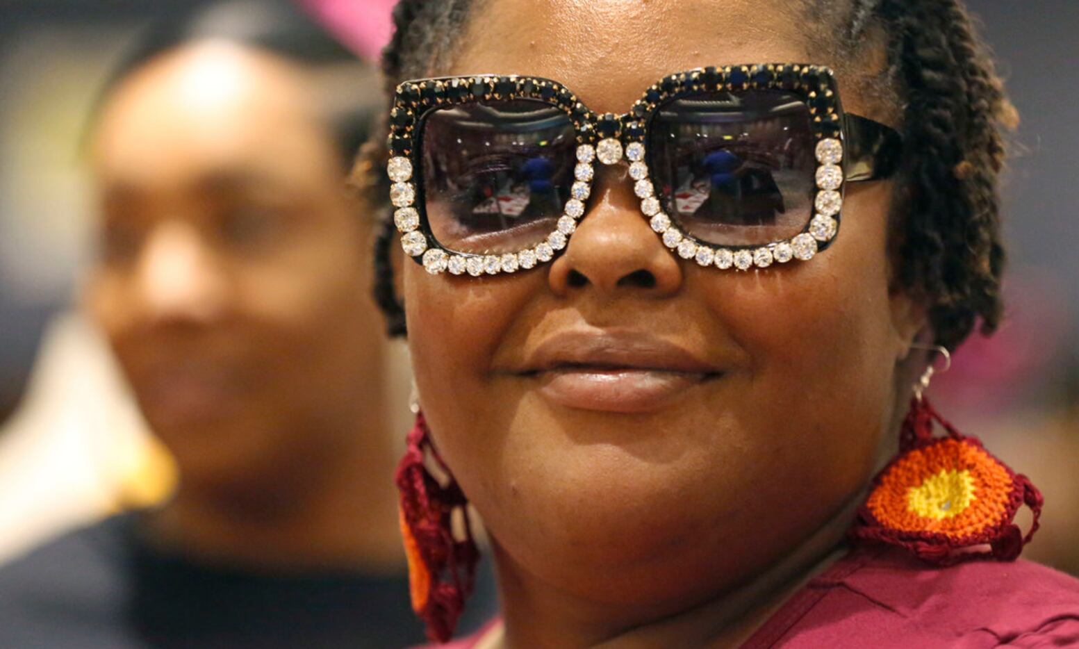 Katrina Whitfield tries on some stylish sunglasses during the Afrolicious Hair and Beauty...