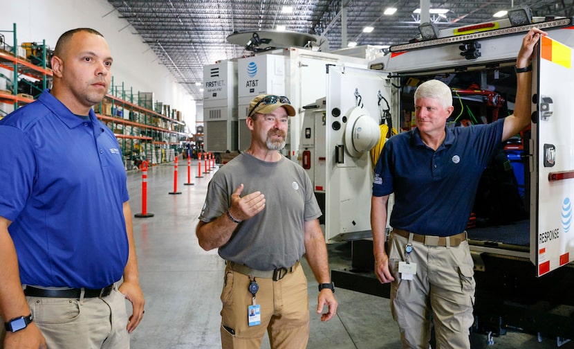 (From left) Shannon Browning, Michael Olier and Dwayne Moore at one of AT&T's National...