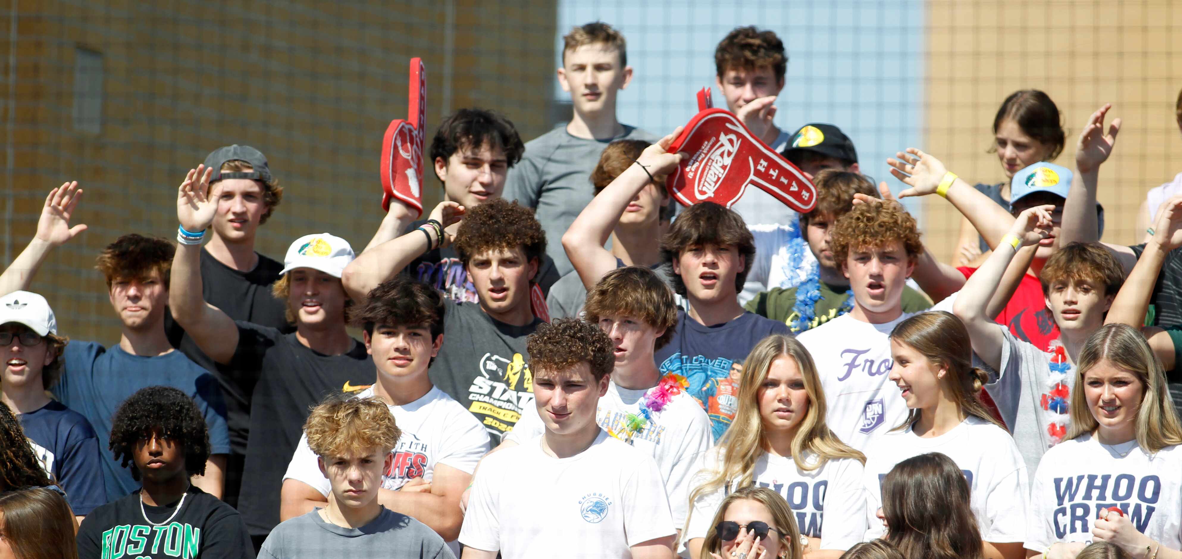 Grapevine Faith Christian fans cheer for their team during the top of the first inning...