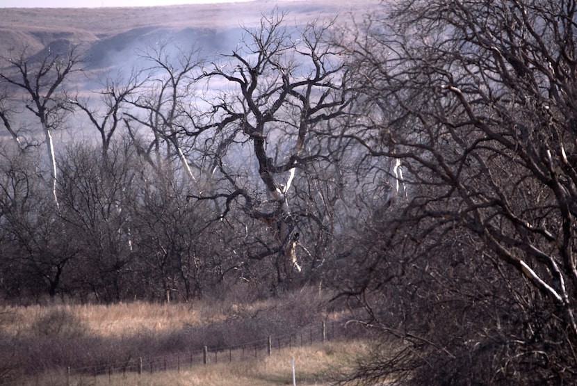 Smoke from the Smokehouse Creek fire is seen outside of Canadian, Texas, on Monday, March 4,...