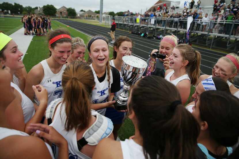 Keller players celebrate after winning the division II Texas Girls High School Lacrosse...