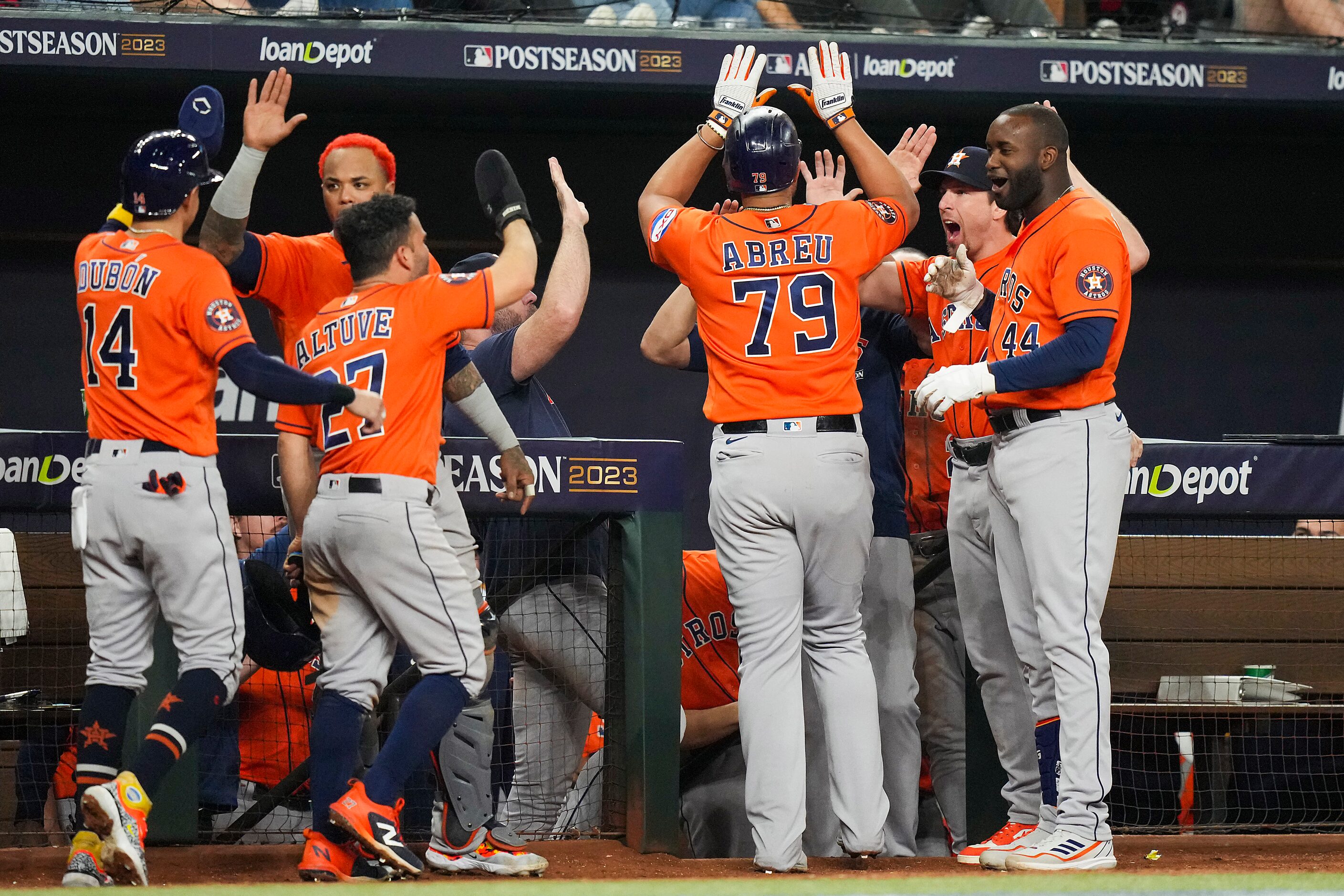 Houston Astros first baseman Jose Abreu celebrates with teammates after hitting a home run...