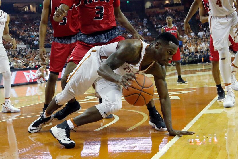 AUSTIN, TX - NOVEMBER 11: Kendal Yancy #5 of the Texas Longhorns moves with the ball against...