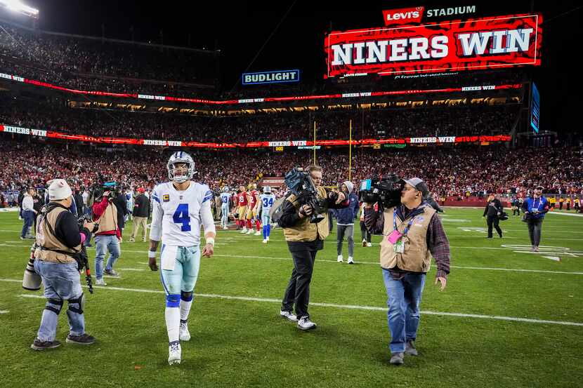 Dallas Cowboys quarterback Dak Prescott (4) leaves the field after a loss to the San...