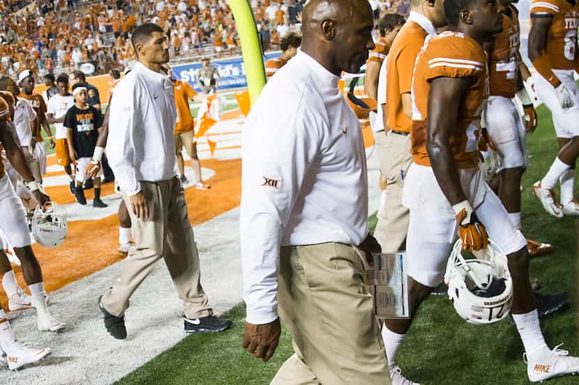 Texas head coach Charlie Strong walks off the field after a 45-44 loss to California in an...