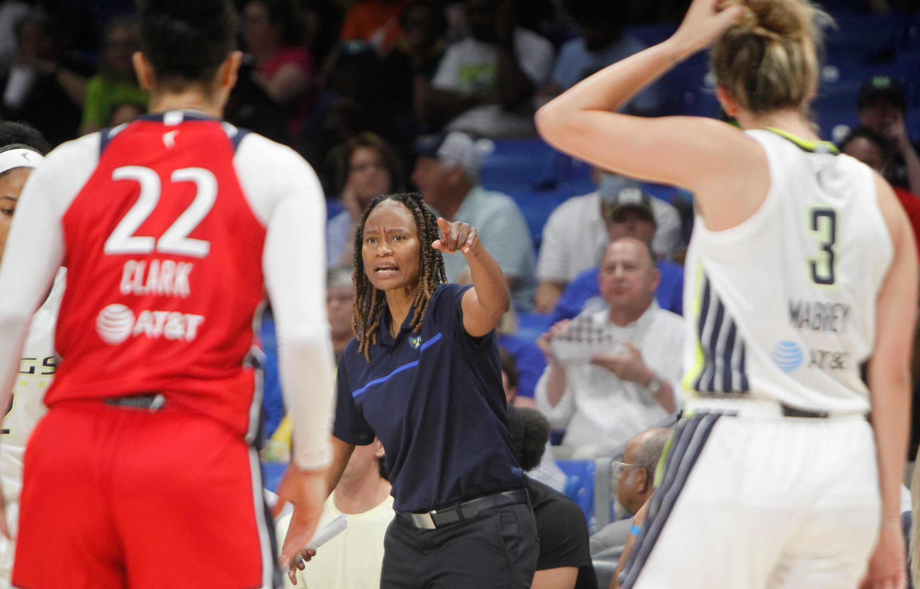Dallas Wings head coach Vickie Johnson directs her players during first half action against...
