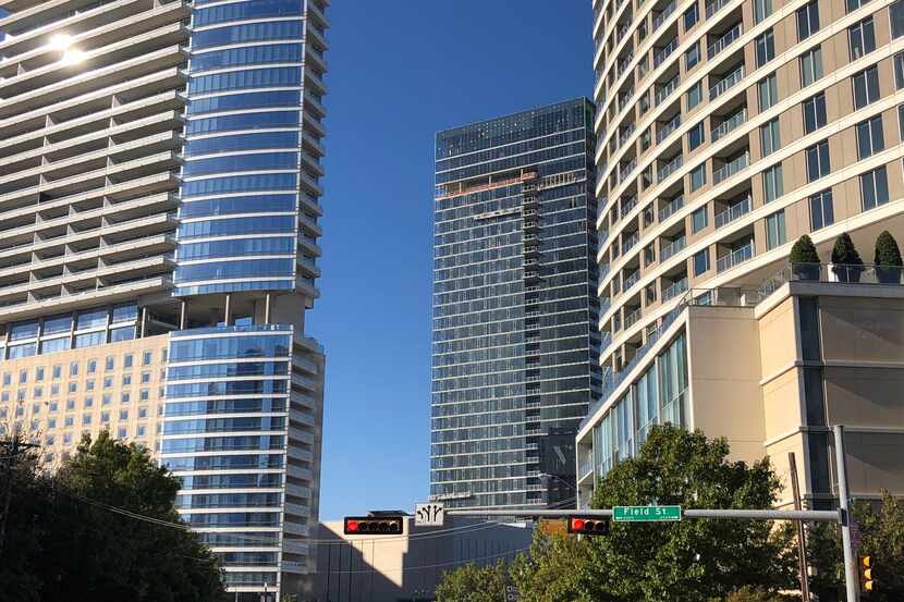 The Cirque tower, on the right, is one of the largest recent D-FW apartment sales.