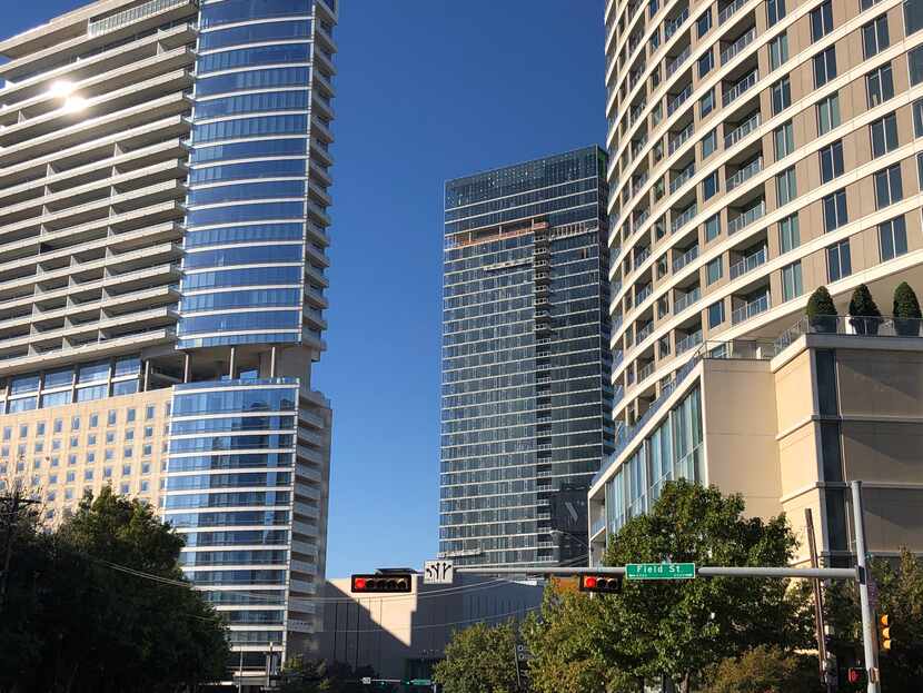 The Cirque tower, on the right, is one of the largest recent D-FW apartment sales.