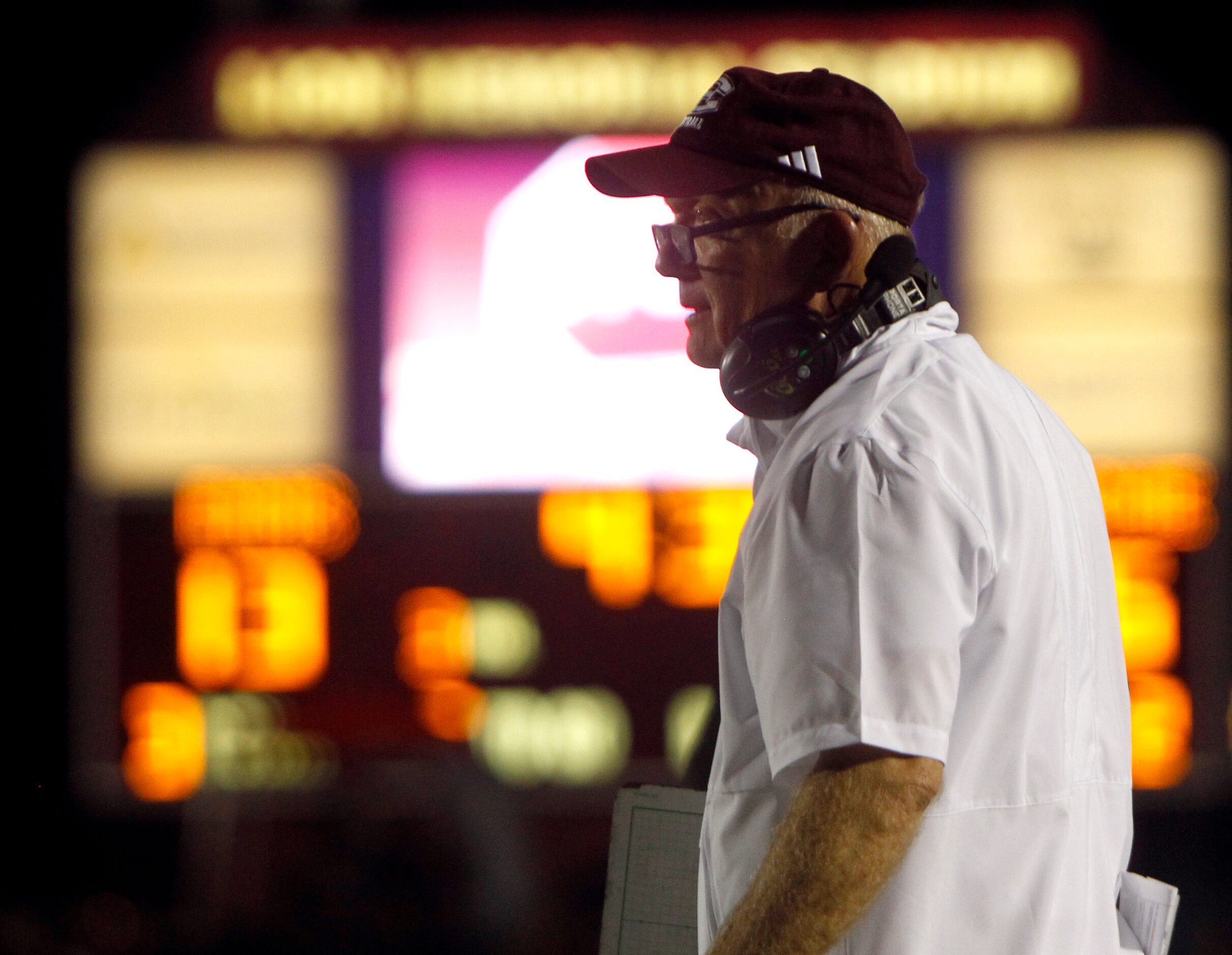 Ennis assistant coach Steve Marrow looks on from the team sidelines during the first half of...