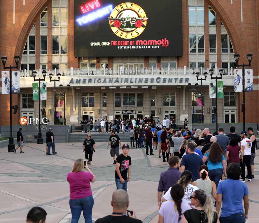 Fans make their way into the center Wednesday night, where masks were required.