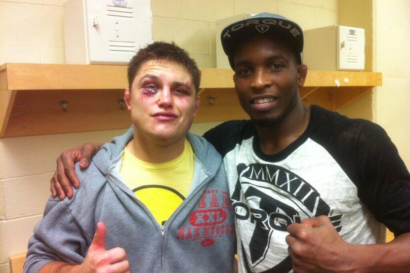 Drew Dober poses with Sean Spencer after their MMA fight in November 2013. @octagonmmatx