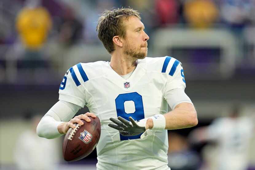 FILE - Indianapolis Colts quarterback Nick Foles (9) warms up before an NFL football game...
