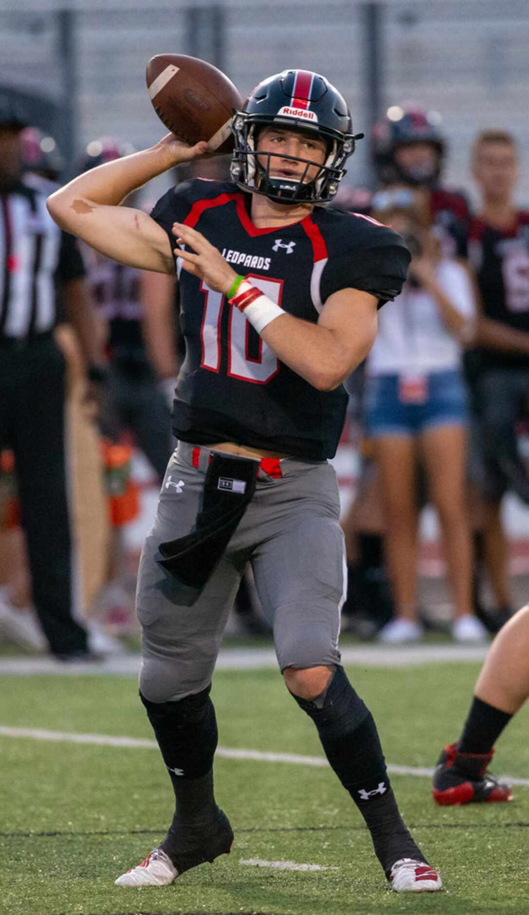 Lovejoy quarterback R.W. Rucker (10) makes a pass early on during the football game between...