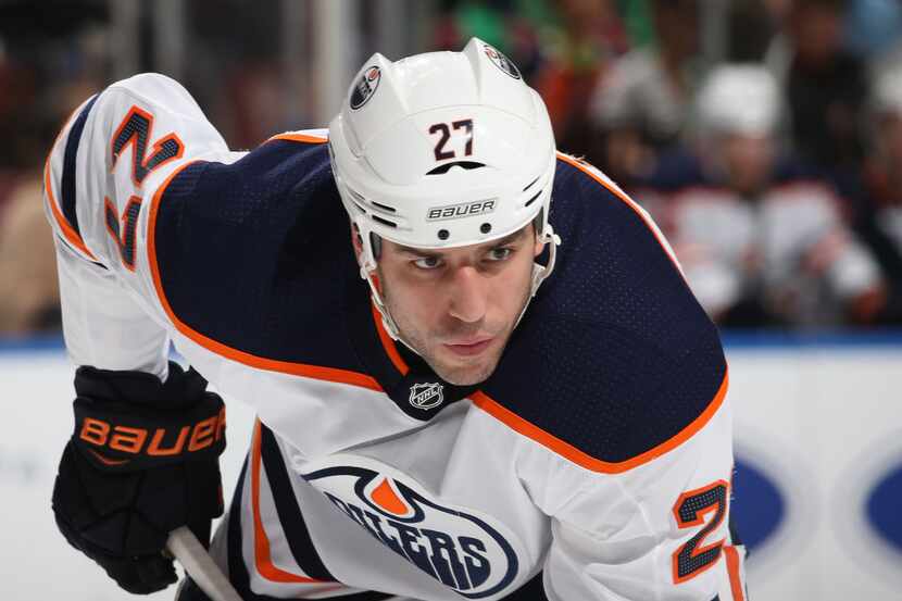 SUNRISE, FL - MARCH 17: Milan Lucic #27 of the Edmonton Oilers prepares for a face-off...