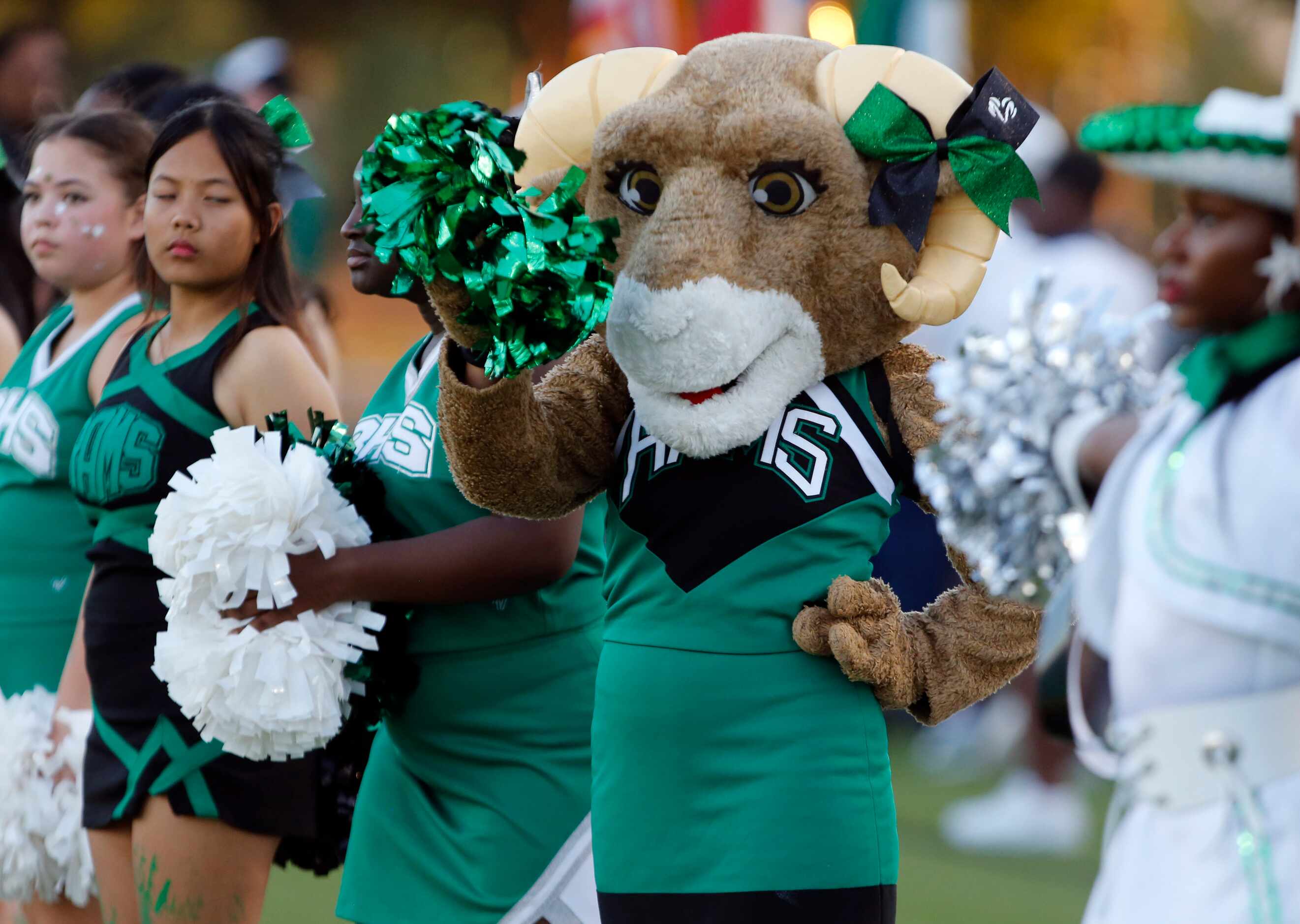 The Richardson Berkner high mascot Ram cheers on the sideline just prior to the start of the...