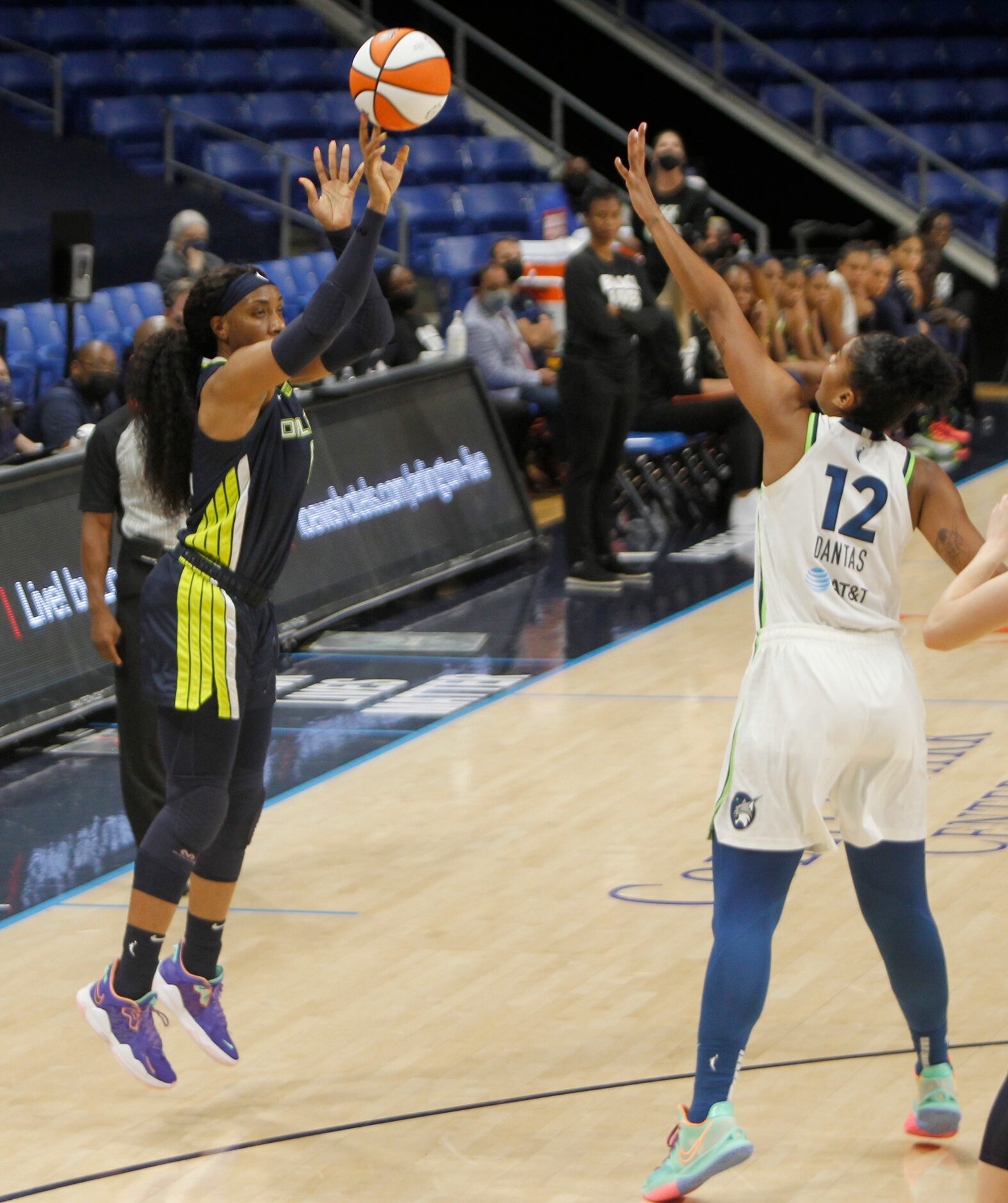 Dallas Wings forward Kayla Thornton (6) scores on a 3-point jumper as Minnesota Lynx forward...