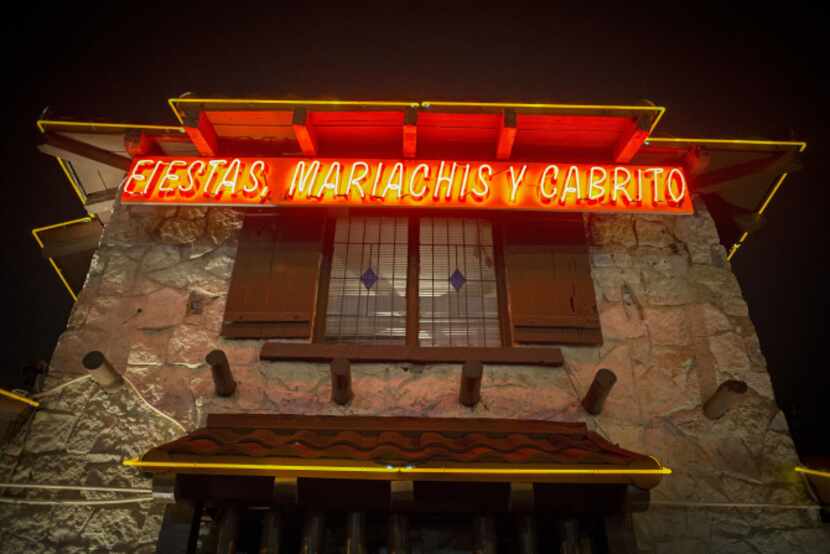 Neon lines flash on the front entrance to El Ranchito restaurant Wednesday, January 8, 2014...