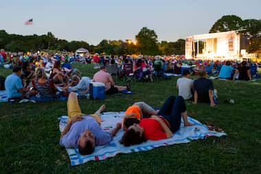 Spectators fill the hillside during the Dallas Symphony Orchestra's annual Memorial Day...