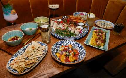 The food at Saaya includes the Dip Trio, Saaya Ultimate Feast, chicken kabob and Greek salad.