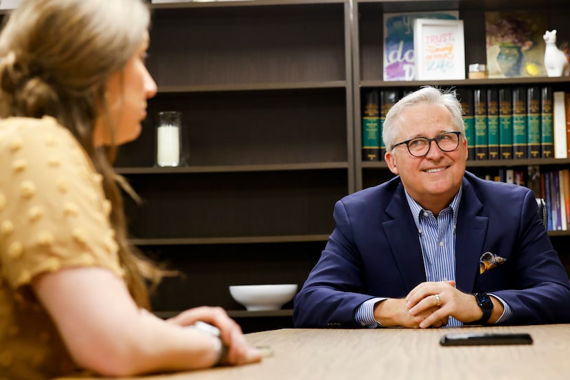 Pastor George Mason (right) listens during a meeting with pastoral resident Brianna Childs...