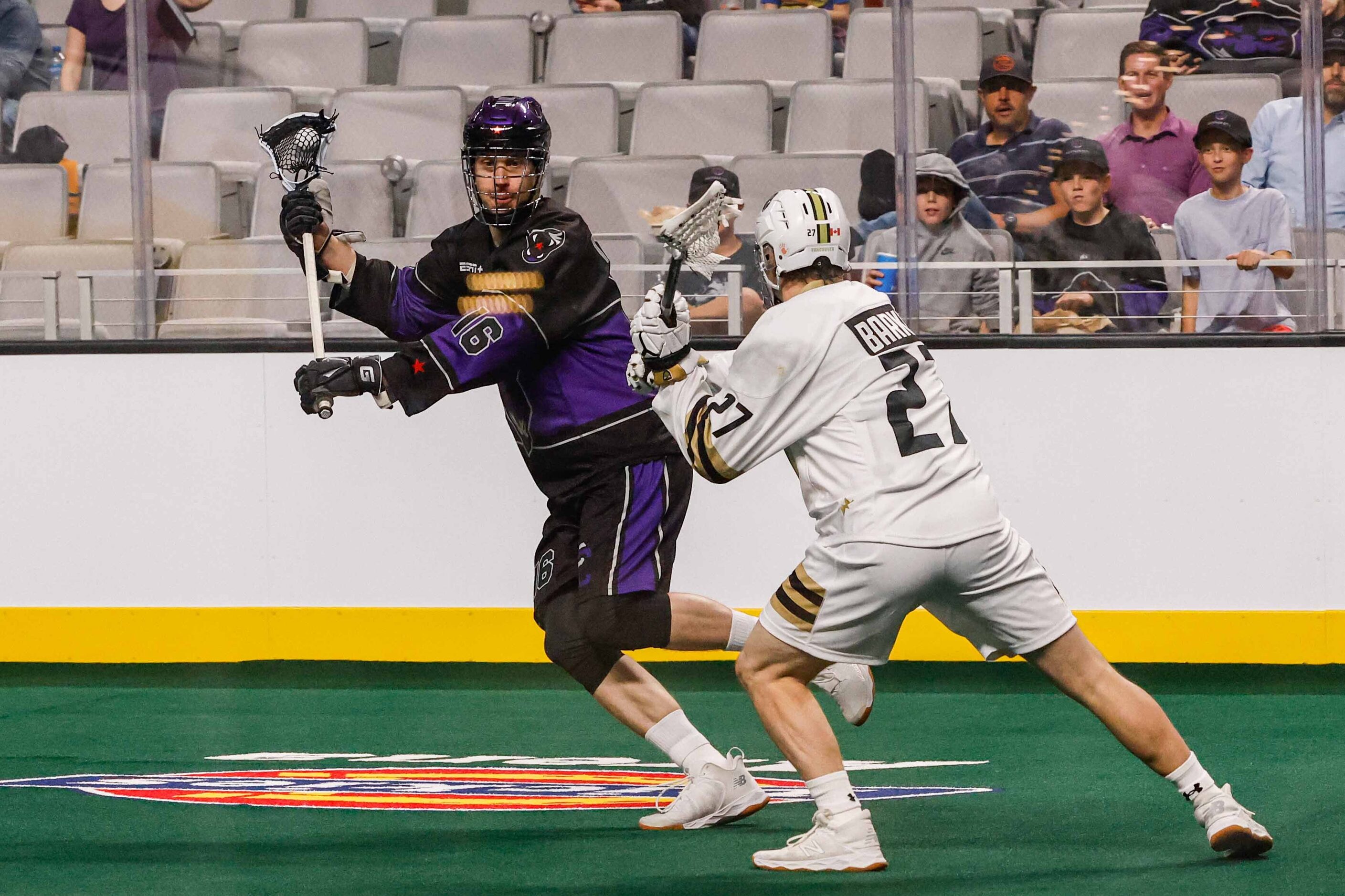 Panther City Mike Triolo (16) tries to make a pass through Vancouver Warriors Owen Barker...