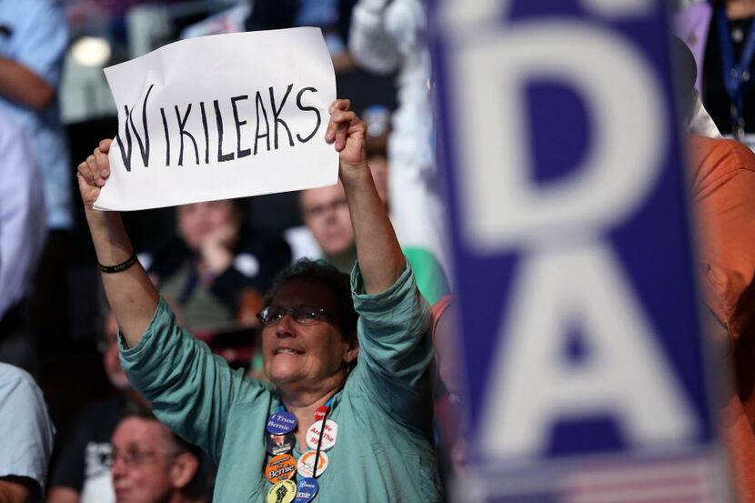 A delegate holds a sign reading "Wikileaks" during the Democratic National Convention (DNC)...