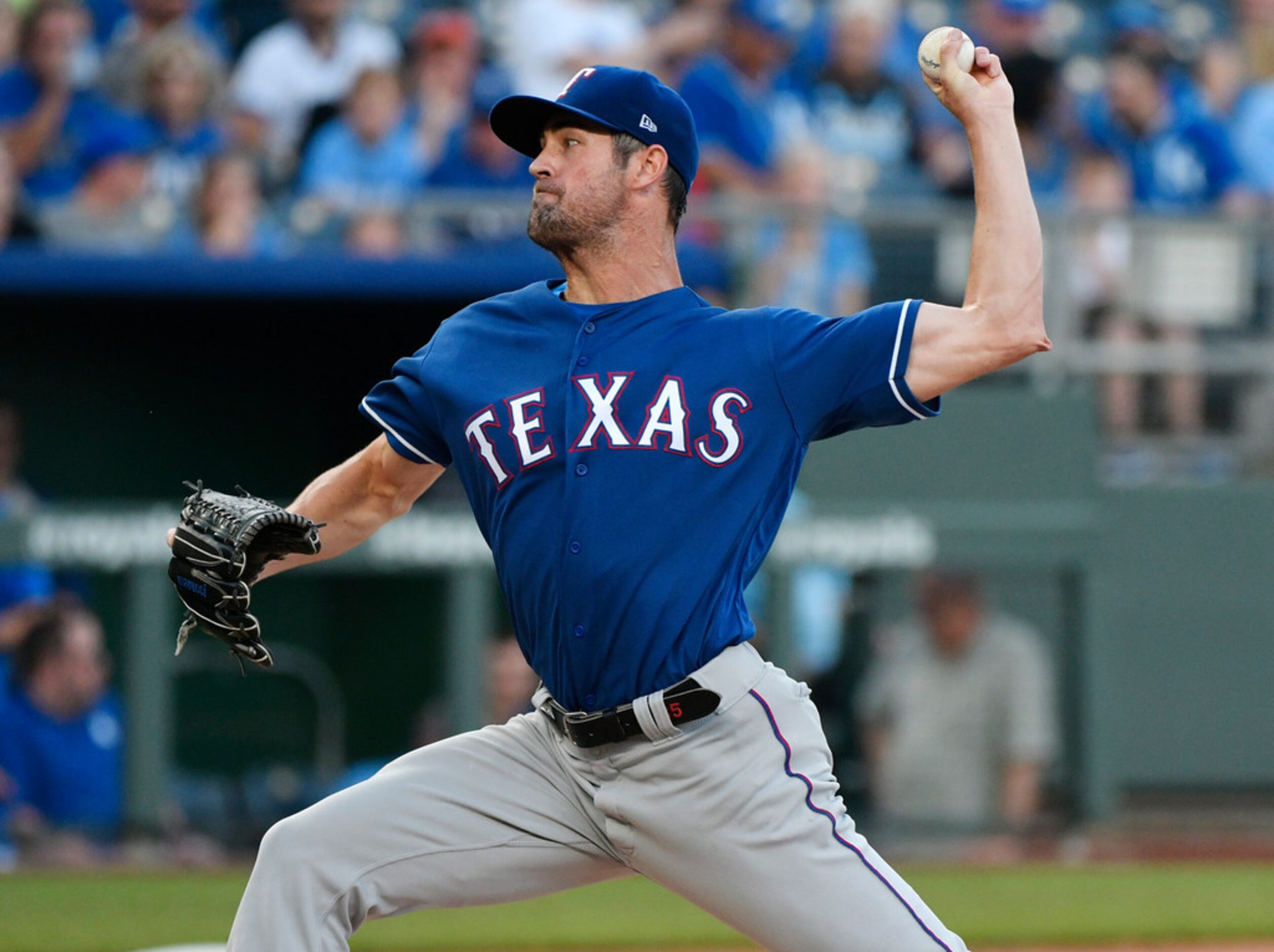 KANSAS CITY, MO - JUNE 19: Cole Hamels #35 of the Texas Rangers throws in the first inning...