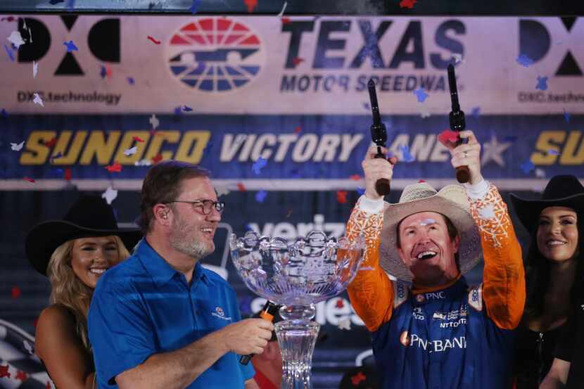 Driver Scott Dixon #9 celebrates after winning the DXC Technology 600 IndyCar Racing Series...