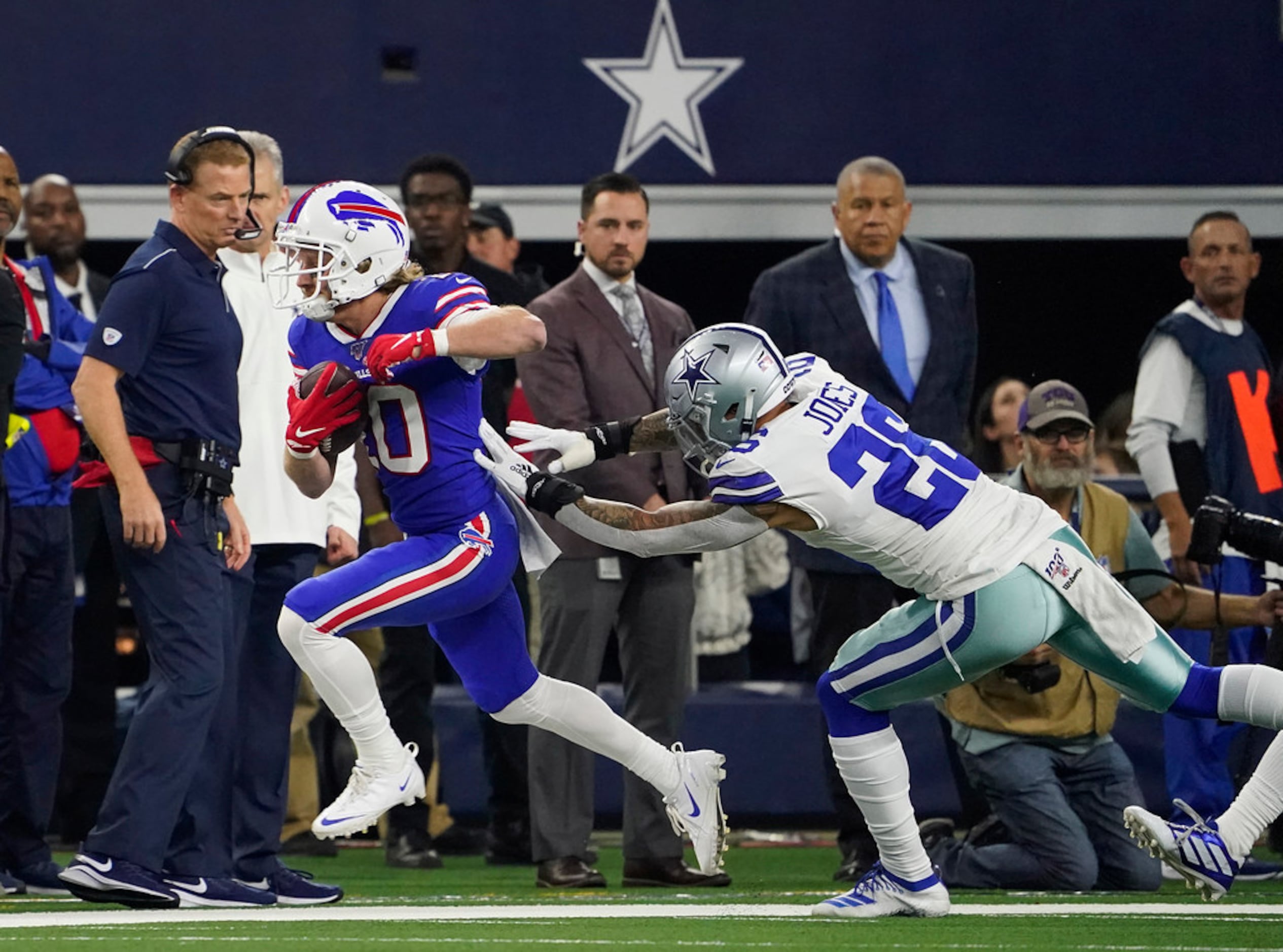 Buffalo Bills wide receiver Cole Beasley (10) is pushed out of bounds by Dallas Cowboys...