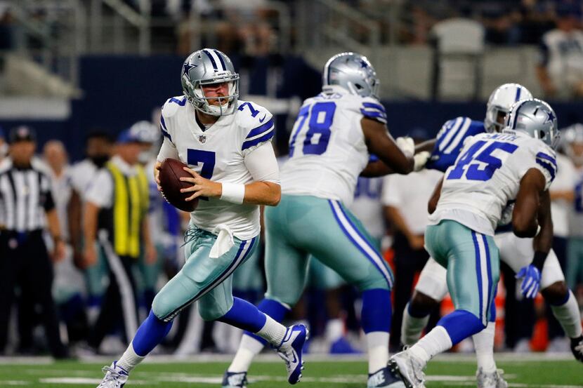 Dallas Cowboys quarterback Cooper Rush (7) prepares to throw a pass in the second half of a...
