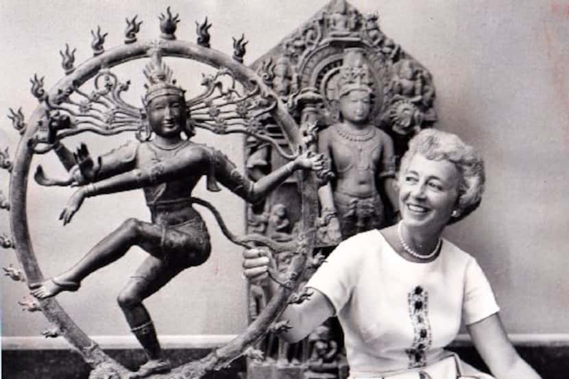 Margaret McDermott with two pieces featured in the "Arts of Man" exhibition in 1962.