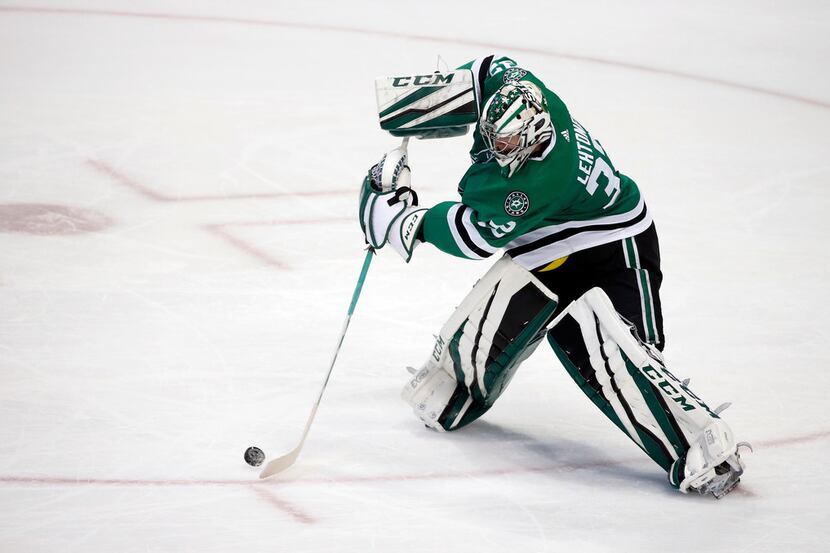 Dallas Stars goaltender Kari Lehtonen (32) clears the puck against the Philadelphia Flyers...