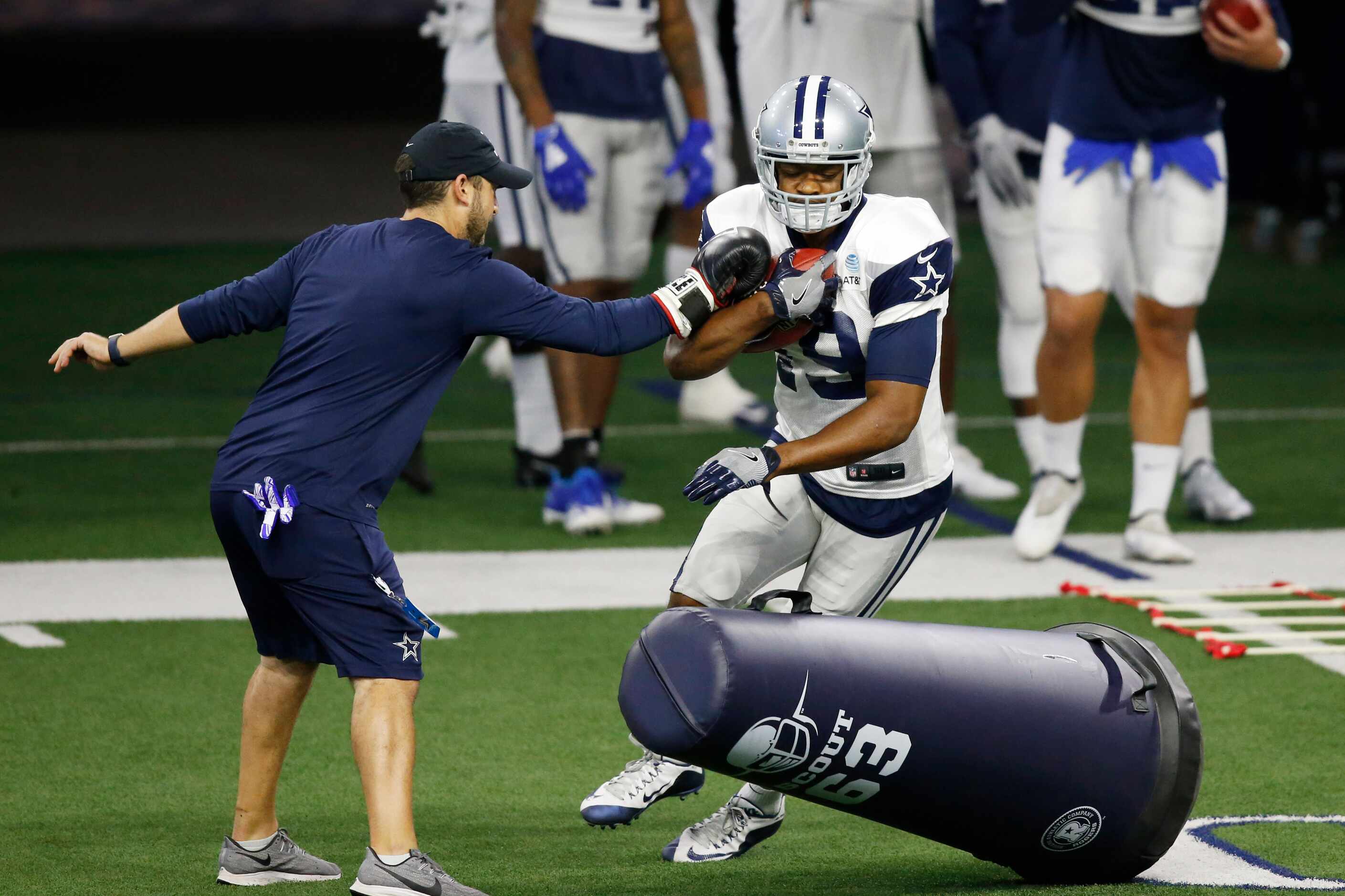 Dallas Cowboys wide receiver Amari Cooper (19) runs through a drill in practice during...