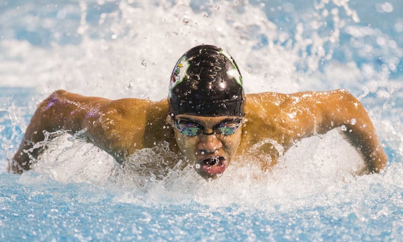 FILE - Southlake Carroll's Jack LeVant swims in the boys 100-yard butterfly final during the...