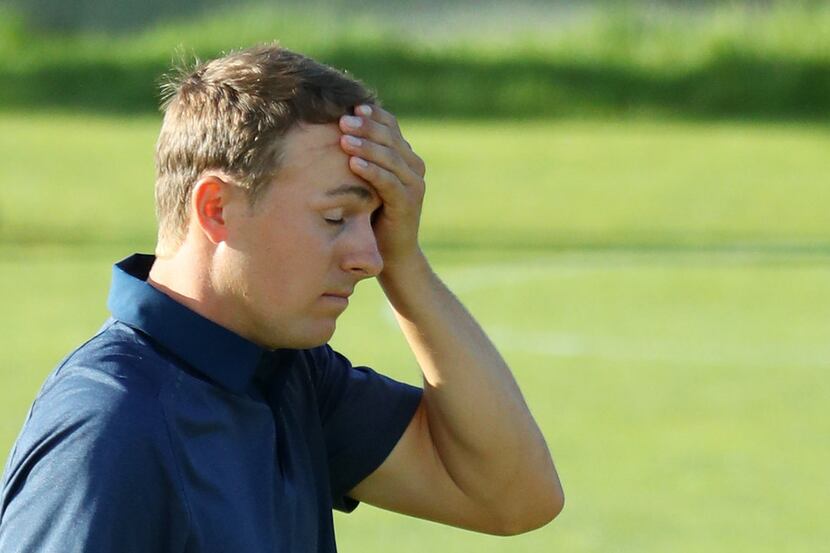 SOUTHAMPTON, NY - JUNE 15:  Jordan Spieth of the United States reacts after a missed put on...