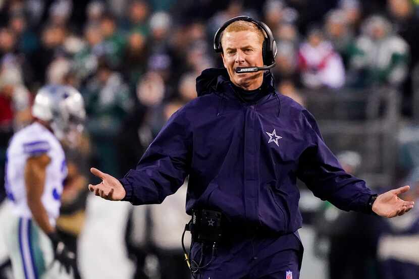 Dallas Cowboys head coach Jason Garrett argues a call during the first half of an NFL...