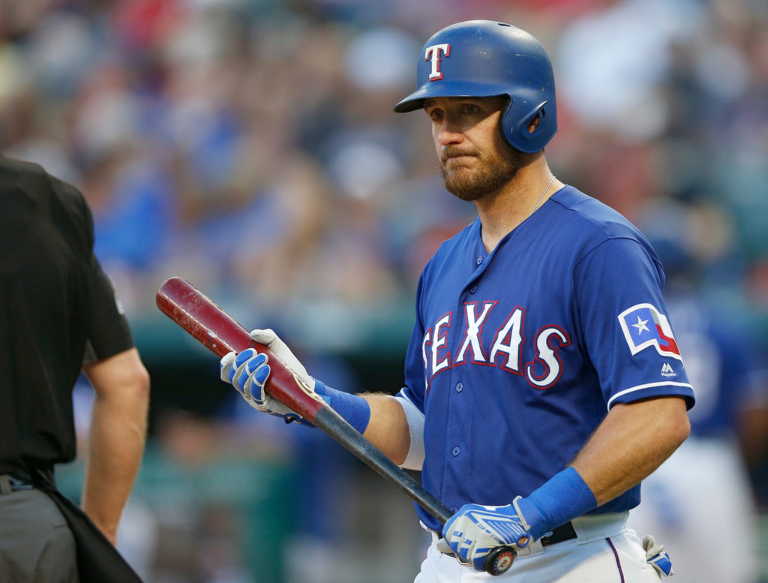 Texas Rangers catcher Jeff Mathis (2) looks towards the Los Angeles Angels dugout as...