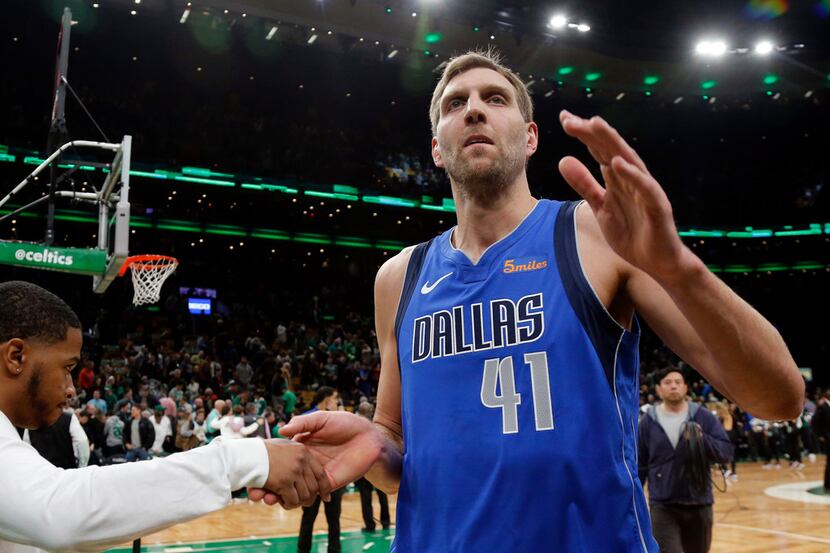 Dallas Mavericks forward Dirk Nowitzki (41) waves to fans at TD Garden after the team's NBA...